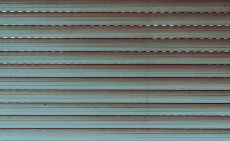 The texture of an aluminum patio blind, seen from the inside.の写真素材
