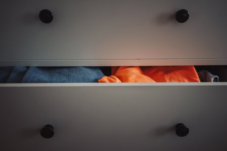 Half-open drawer with things, abstract composition.の写真素材