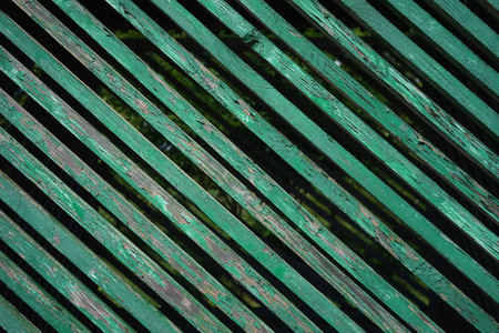 Texture of old green wooden fence, aged, abstract composition.