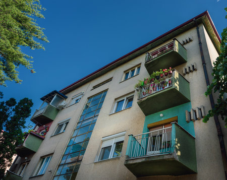 Old building with nice terraces, seen from below, clear sky in the background.の写真素材