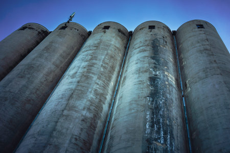 Architecture and details of old grain silos, abstract composition.