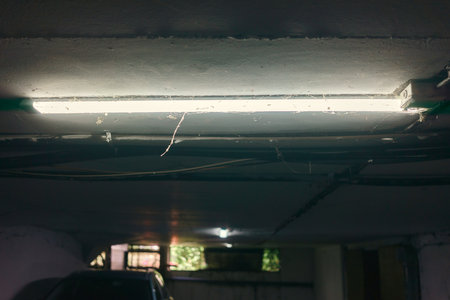 Cobweb lighting in the basement on the ceiling.の写真素材