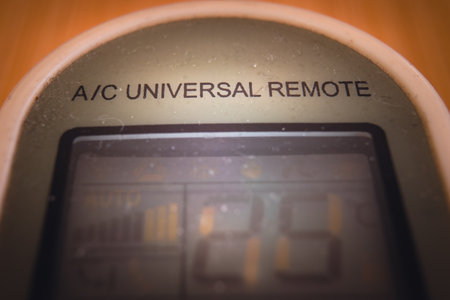 Universal remote control for air conditioners, macro display composition.の写真素材