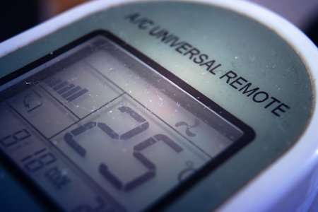 Universal remote control for air conditioners, macro display composition.の写真素材