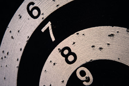 Numbers 6, 7, 8 and 9 on a used dartboard, close up view.の写真素材