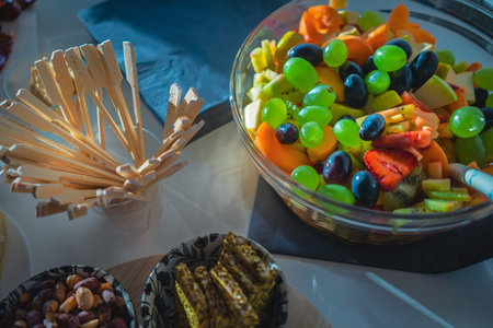 A delicious fruit salad in a glass bowl as a serving at a celebration.の写真素材