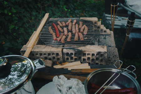 Kebabs and sausages on the grill, close-up view.の写真素材