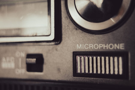 Microphone on an old radio set, macro view.