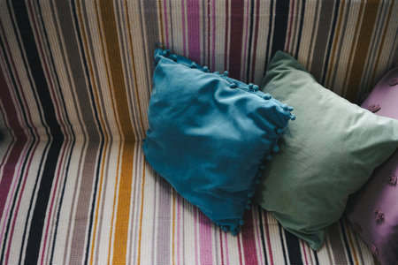 Colorful pillows and bedspread, lifestyle, details.の写真素材