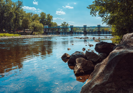 Nature landscapes around the Zapadna Morava river near Cacak in Serbia during the summer, the old dam in the distance.の写真素材