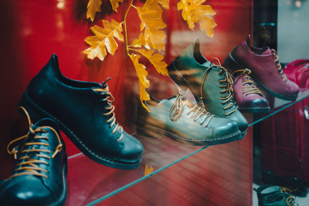 New fashionable shoes in store window, autumn season.の写真素材