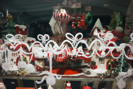 New Year shop window design, decorations and various ceramic objects in the spirit of the holiday.