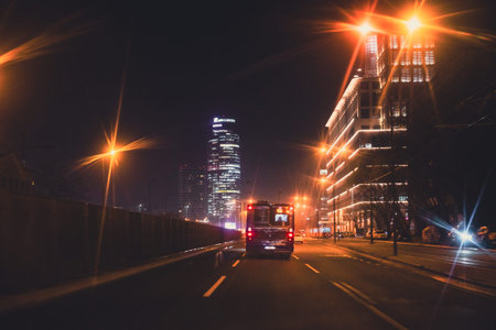 Belgrade, Serbia - January 22, 2026: Traffic on the streets in the city center at night.
