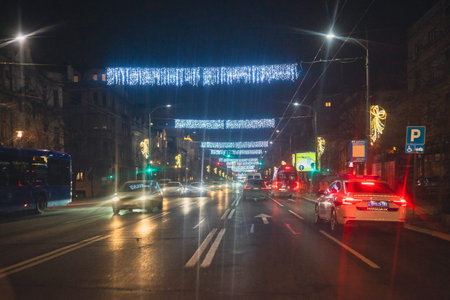 Belgrade, Serbia - January 22, 2026: Traffic on the streets in the city center at night.のeditorial素材