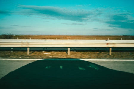 View of nature through the car window while traveling, dramatic scenes of central Serbia during the...