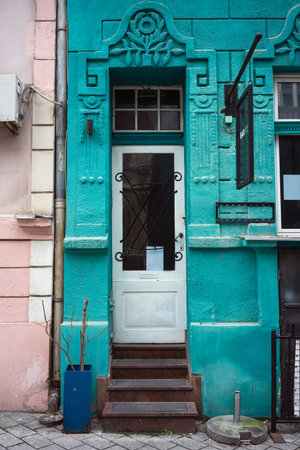 Entrance to an old abandoned building, interesting facade with bright colors.の写真素材