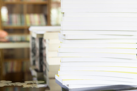 Books stack in library.の写真素材