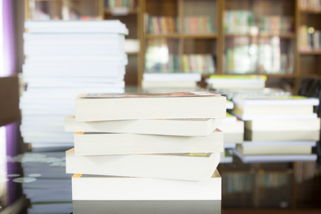 Books stack in library.の写真素材