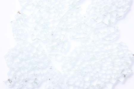 Broken glass background isolated on white.の写真素材