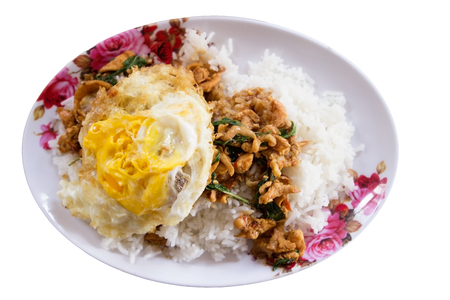 Stir-fried minced pork with holy basil and steamed rice Thai food.の写真素材