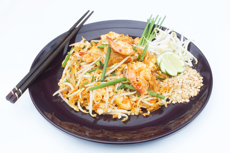 Thai food Pad thai , Stir fry noodles with shrimp in padthai style isolate white background.の写真素材