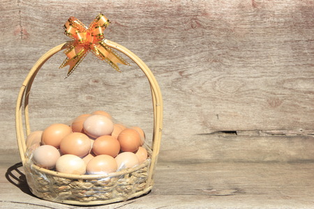 Gift eggs on wooden background.の写真素材