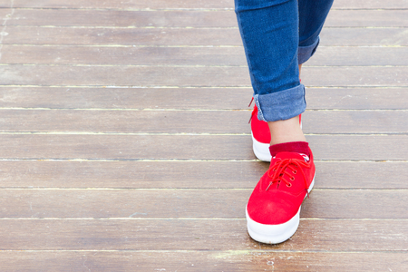 Woman jeans and sneaker shoes.の写真素材