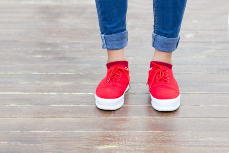 Woman jeans and sneaker shoes.の写真素材