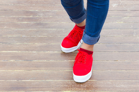 Woman jeans and sneaker shoes.の写真素材