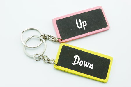 Photo of key bunch with business conceptual words,Up and Down.の写真素材