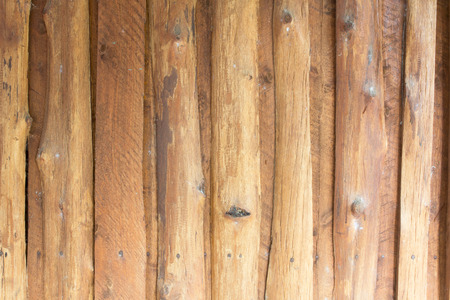 Wooden logs wall of rural house background.の写真素材