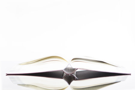 Open book isolated on white background.