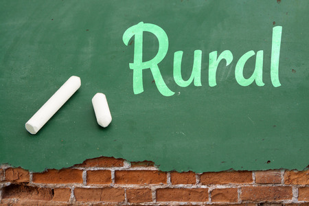 Rural.board on cracked concrete vintage wall background with Chalks.の写真素材