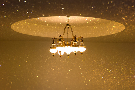 beautiful crystal chandelier in ambient light.の写真素材