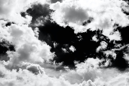 Isolated clouds over black.の写真素材
