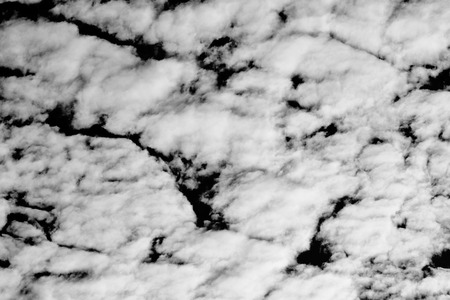 Isolated clouds over black.の写真素材