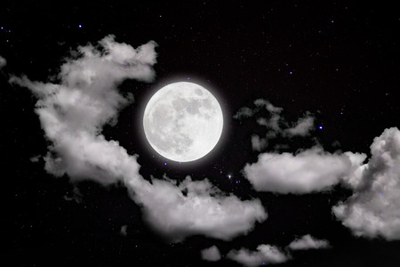 Romantic night.full moon in space over stars with cloudscape background.の写真素材
