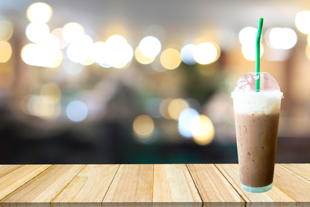 Ice coffee .Coffee and blurred cafe with bokeh light background.の写真素材