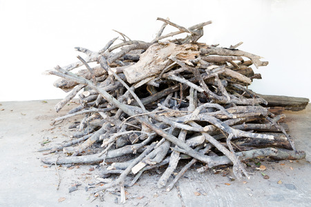 Pile of firewood isolated on  white background.の写真素材