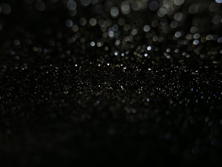 Abstract dark .Gold blurred background.の写真素材
