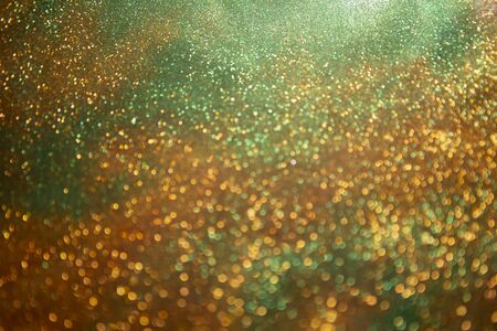 Glitter vintage lights background.Abstract Gold. Glitter wonderful lights background.の写真素材