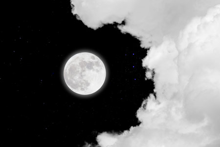 Full moon with starry and clouds background in Dark night.