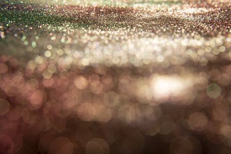 Glitter vintage lights background. Abstract blur background.の写真素材