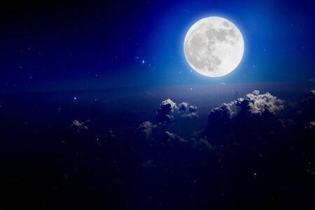 Full moon with starry and clouds background. Romantic night. の写真素材