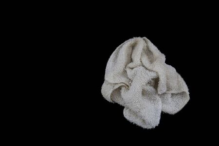 Dirty rag isolated on black background.の写真素材