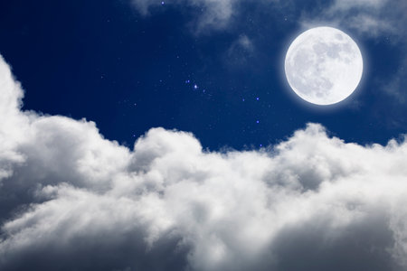 Full moon with starry and clouds blurred background. Romantic night.の写真素材