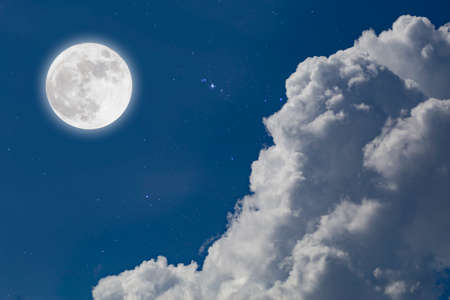 Full moon with starry and clouds background. Romantic night.の写真素材