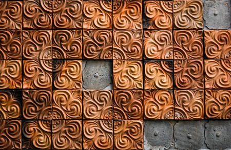 The brown clay tiles wall in the house ,be damaged.の写真素材