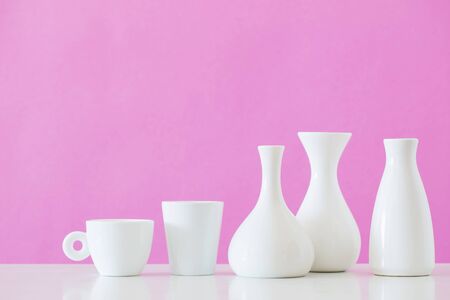 white  vases  on pink backgroundの写真素材