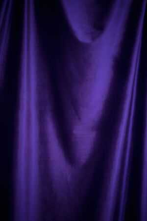 purple  velvet fabric background close upの写真素材